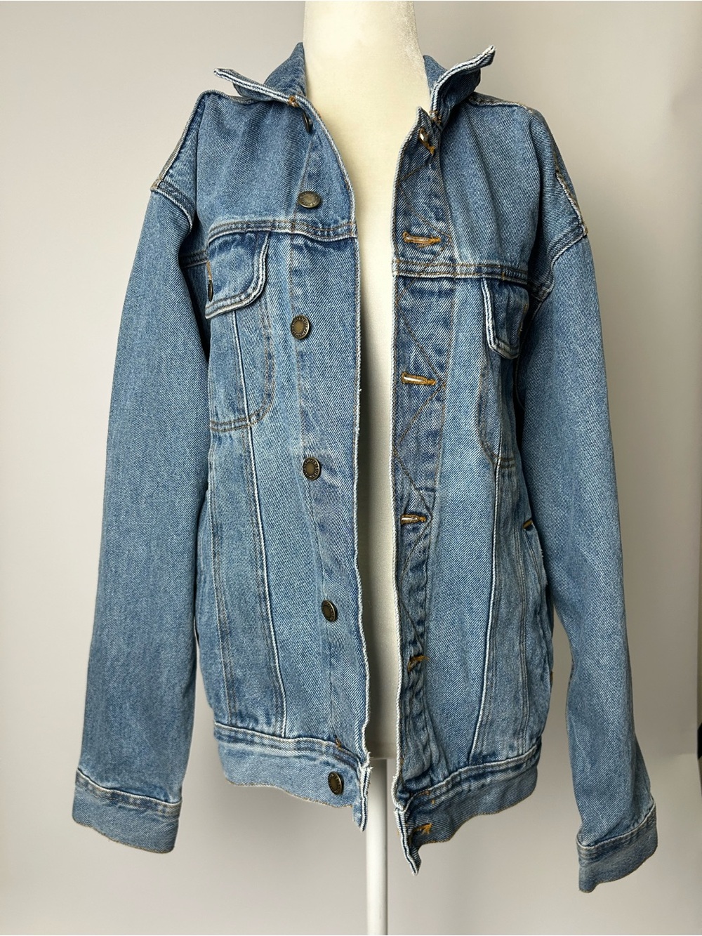 Wrangler light blue denim jacket with maroon logo tag